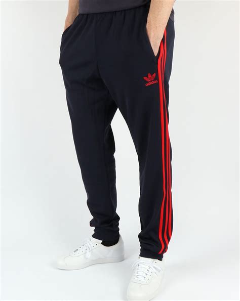 cheap adidas original tracksuit bottoms|Adidas track bottoms men.